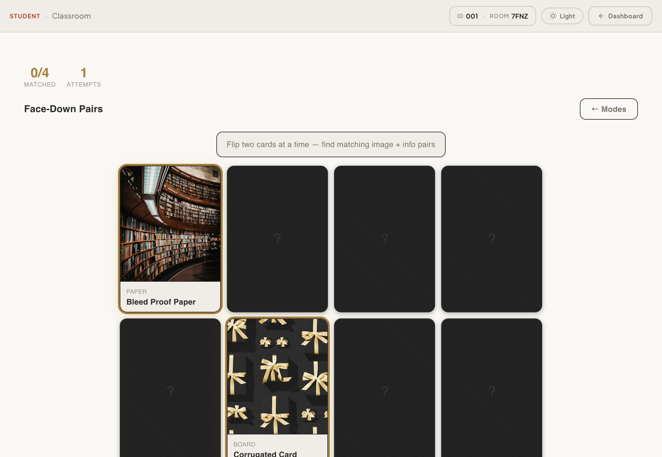 Face-Down Pairs with a grid of face-down cards. Two are flipped: Bleed Proof Paper and Corrugated Card, which don't match.